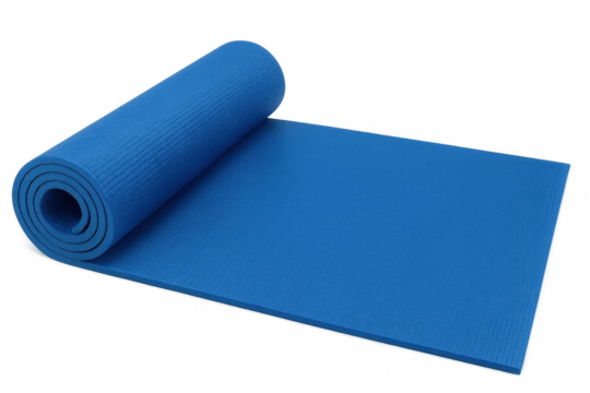 Partially rolled blue yoga mat lying flat, providing clean surface for wellness practice against neutral backdrop