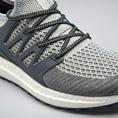 Close-Up of Modern Running Shoe with Mesh Upper and Foam Sole

