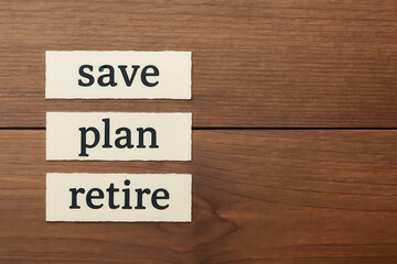 Save plan retire words on wooden background symbolize budget retirement plan for future financial security and peaceful life with smart saving and planning