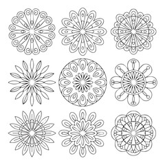 Set of nine detailed floral mandala designs isolated on white background