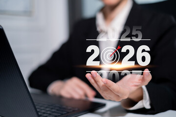 Professional businessman focusing on 2026 future goal success development planning for marketing...