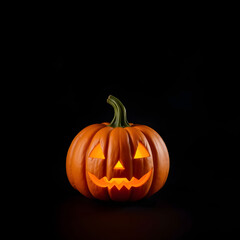 Orange Halloween pumpkin in the center of the image with a dark background