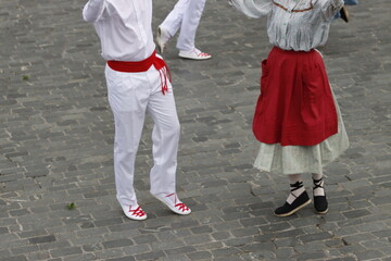 Basque traditional folk dance in an outdoor festival
