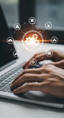 Person typing on laptop with glowing network of technology icons and gears business digital marketing
