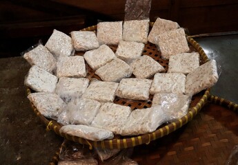 Tempeh is a fermented soybean product made with the fungus Rhizopus oryzae. It is a traditional Indonesian food.