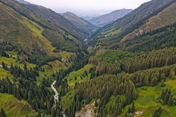 Alma-Arasan Gorge. Ile-Alatau National Park. Mountainous terrain with different vegetation and...