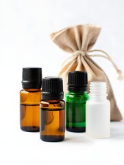 Essential Oils and Linen Bag on White Background