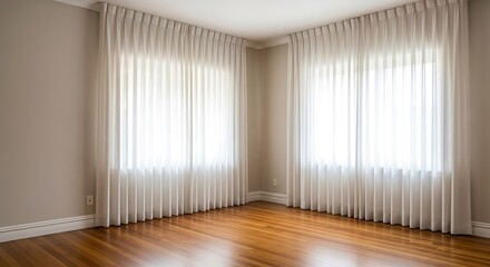 Obraz premium Bright and Airy Empty Room with Hardwood Floors and White Curtains Enhancing Natural Light