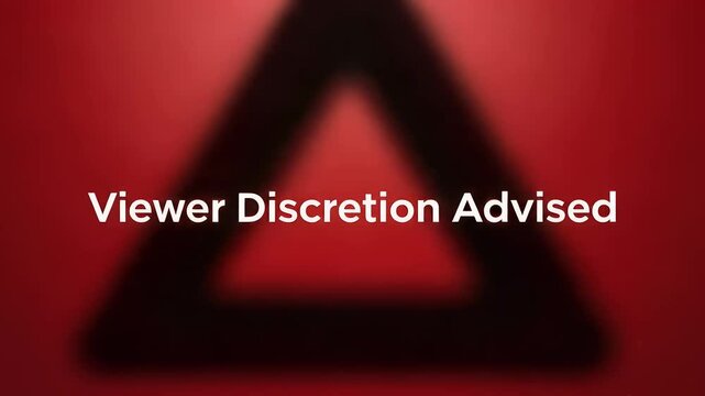Blurred red danger backdrop with sharp viewer discretion text