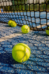 Detail of a Padel Ball and Net Shadow in Bright Light