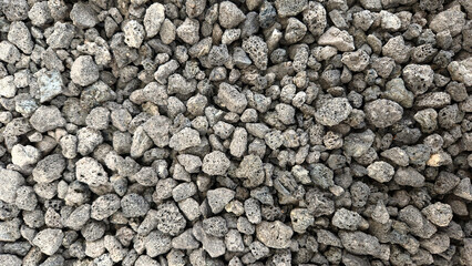 Black lava rock gravel for horticulture, ideal for bonsai, succulents, and cactus. Use as decorative top dressing, pot filler, or soil additive.
