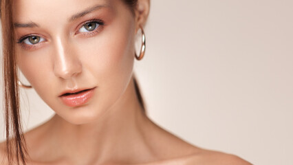 Close-Up Beauty Portrait With Natural Makeup, Hoop Earrings And Smooth Skin 