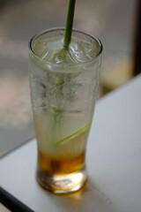 lime ice in a glass. cocktail with lime. 