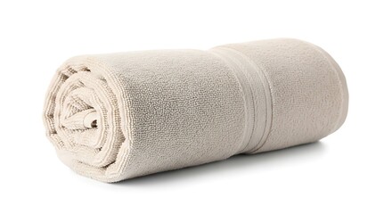 Rolled beige towel isolated on white background
