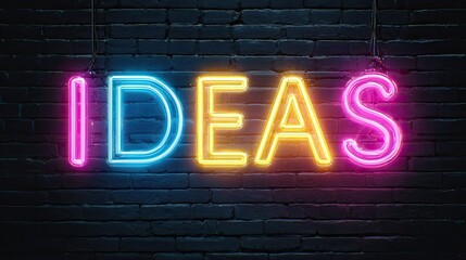 Neon "IDEAS" sign on dark brick wall (1)