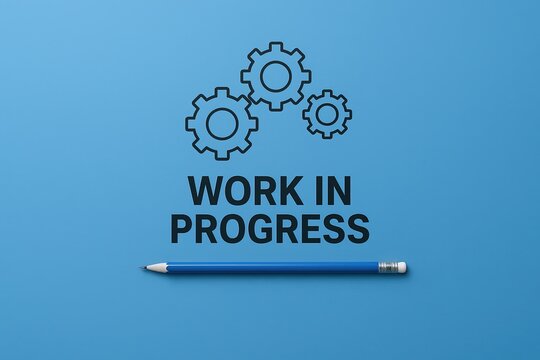 Work in Progress Concept with Gears and Pen on Blue Background for Creativity.