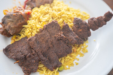Nigerian Spicy Suya served with vegetable fried rice