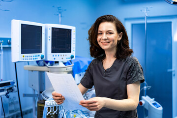 Smiling nurse in modern medical facility. Nurse stands confidently, reviewing important documents...
