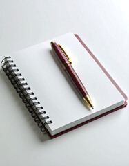 Notebook and Pen on White Background