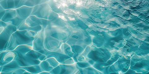 Turquoise water surface with soft ripples and reflections creating a relaxing background