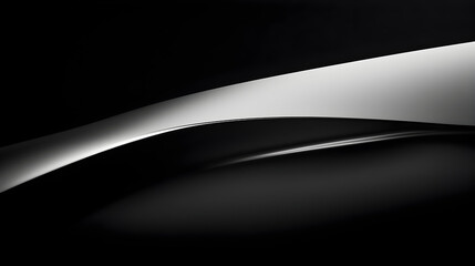 Abstract close-up of smooth, flowing curves in light gray and dark gray.  Intricate interplay of light and shadow, creating a sense of depth and dynamism