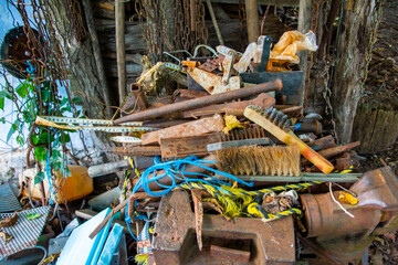 A pile of junk sitting on top of a pile of metal items