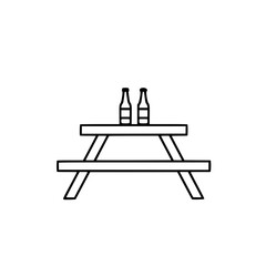 Picnic table with two bottles representing International Beer Day  