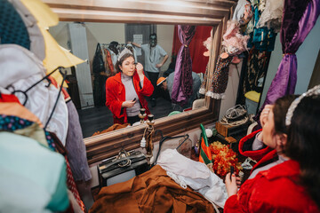 Actors preparing in a theater dressing room, capturing candid moments as they get ready for a...
