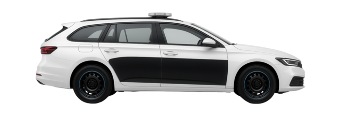 White and black police estate car with roof light bar and side decals