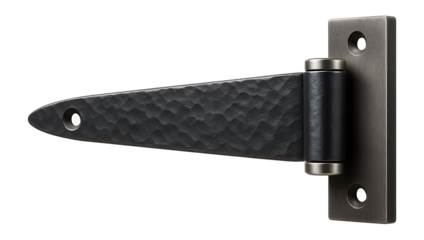 Forged steel strap hinge with a rustic appearance for barn-style doors in a rural workshop