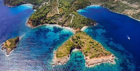 Gordijnen Greece, green picturesque  Sporades. Alonissos island beast scenic beaches - Kokkinokastro and Chrisi Milia, aerial drone high angle view. greek summer destination © Freesurf