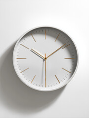 Minimal white wall clock casting shadow on white background