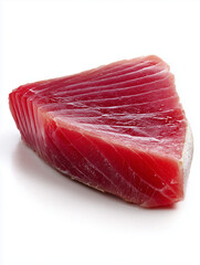 Raw tuna steak wedge isolated on white background