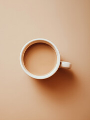 Top view of coffee mug with latte on beige background