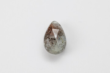 Moss Aquamarine Teardrop Gemstone with Natural Inclusions on White Background