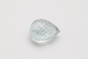 Light Blue Fluorite Gemstone in Diamond Shape on White Background

