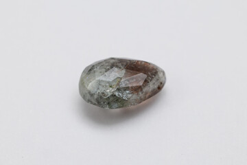 Moss Aquamarine Teardrop Gemstone with Natural Inclusions on White Background
