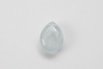 Aquamarine Teardrop Gemstone on White Background

