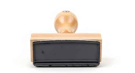 Official Rubber Stamp: A close-up view of a classic wooden rubber stamp, meticulously crafted with an ergonomic handle, awaits its pivotal role in authenticating documents and official transactions.