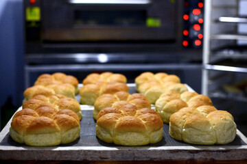 Fresh bread  from the oven Industrial bread, delicious pastries for breakfast.