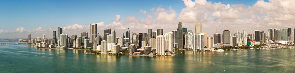 Fototapeta premium Aerial view of Brickell skyline. Panoramic cityscape of Brickell Miami. Skyscrapers of Brickell. Scenic view of the Brickells financial district. Brickell in Miami Beach. Iconic business towers.
