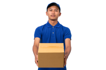 Smiling young asian delivery man wearing blue uniform holding cardboard box on white background