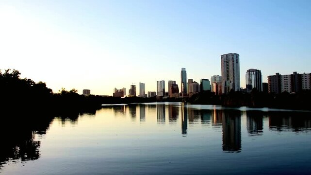 Austin, texas skyline reflecting in the water at dusk