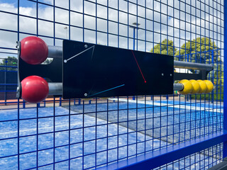 An official padel scoring table with color-coded balls (red/yellow) for different match phases. The clean design emphasizes precision and professionalism in sports event.
