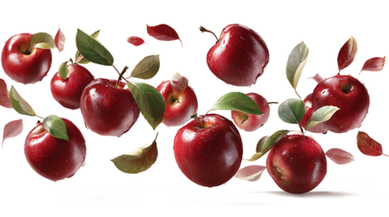 Falling red apples with leaves and motion trail, isolated on a white background.