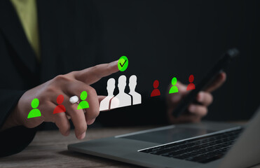 Professional selecting suitable candidate using digital filtering system on laptop, highlighting approved and rejected applicants, symbolizing HR selection, recruitment strategy, smart hiring tools.