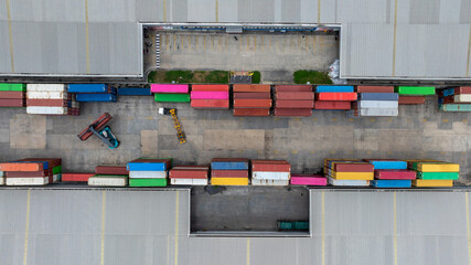 Aerial view semi truck cargo trailer at logistic park warehouse goods, Distribution warehouse...