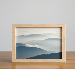 Misty blue mountains at sunrise, layered serene landscape, perfect for nature, travel, or minimalist themes. High-quality photo frame display, ideal for serene and atmospheric visuals.