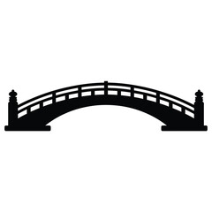 Silhouette of a curved wooden bridge with railings