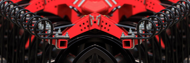 Agricultural machinery and parts of mechanisms on a sunny day. Texture, background for design. 